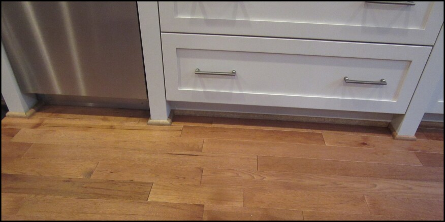 Shoe molding used to cover a small gap.