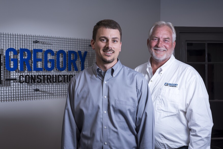 Aaron Gregory (left, with his father) is founder and president of Gregory Construction in Huntsville, Ala.