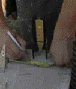 Finally, they locate the perpendicular line by placing the target on the adjoining wall so that the side beam hits it dead center, mark that location, and measure in one inch to account for the offset between the down beam and side beam on the PLS5 laser.