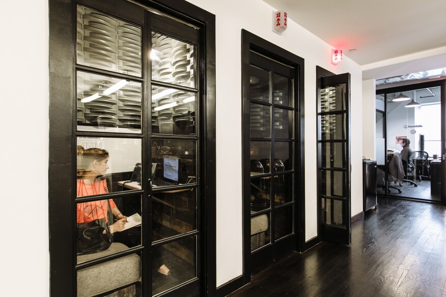 Phone booths, available on a first come, first served basis, give WeWork members privacy.