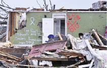 The wreckage of this home, in the aftermath of a tornado that struck Tuscaloosa, Ala., on April 27, demonstrates the tendency of some interior rooms to remain largely intact even when the rest of a structure has been demolished.