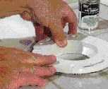 The author inserts the new flange.