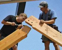 A pegged mortise-and-tenon joint at the peak.