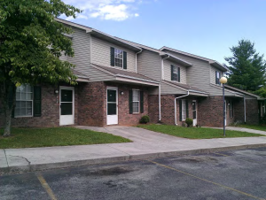 Suncrest Apartments in Newport, Tenn., is among the 20 properties involved in a pooled bond transaction by developer and owner Hallmark Cos.