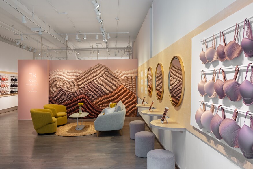 When the online bra-seller ThirdLove wanted a bricks-and-mortar outpost in New York, Alda Ly Architecture responded with a playful yet sophisticated design. Individual dressing rooms are topped with neon breast-shaped occupancy lights, and a residential-style lounge features an abstract wall sculpture made from bras.
