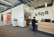 Wood tones and texture compliment the calming atmosphere and engaging marquee surrounding the reception desk welcoming newcomers to the school.