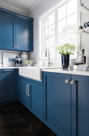 This kitchen features knobs and pulls from Tob Knobs' Devon collection.