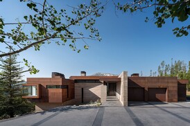 Concrete and Steel Create Modern Meets Mountain's Grand Exterior