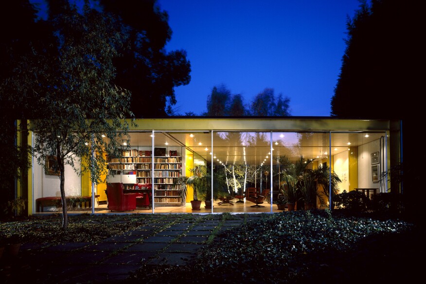House for Dr Rogers, Wimbledon, 1968 - 1969. Overall elevation at dusk