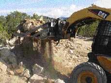 The author frequently uses a rock rake ($1,000) to prepare soil for backfilling utility trenches and final grading. The tool sifts out large- and medium-sized rocks so they won't damage underground utilities; the separated rocks can often be used for other purposes. The rake can also eliminate the need to import clean fill for backfill.