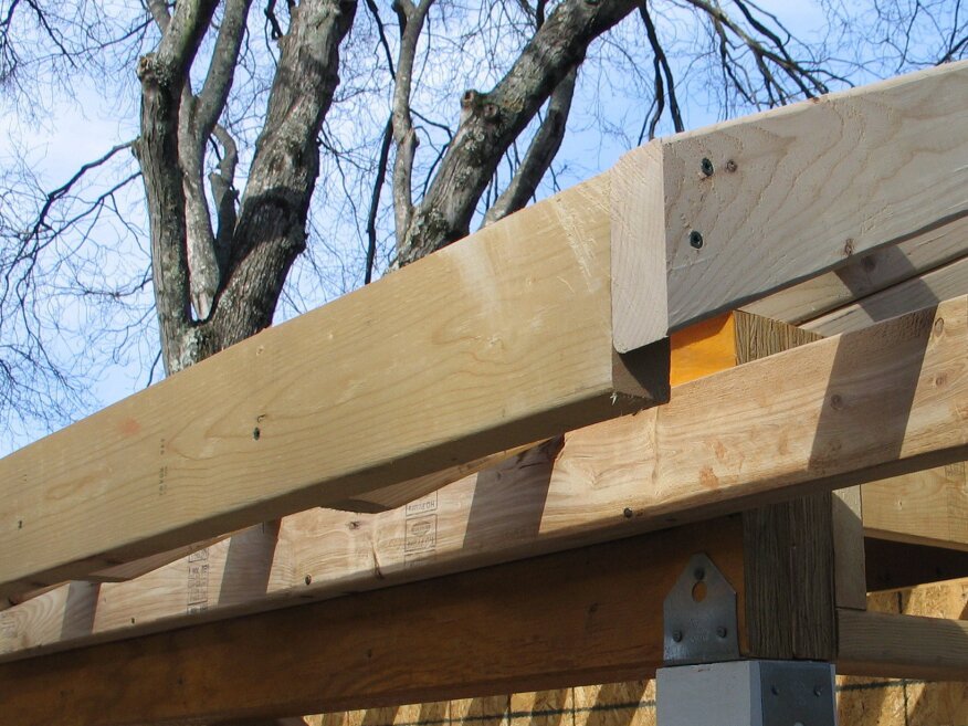 After the ends of the lookouts are cut, the barge rafter is installed and the end is cut flush with the subfascia.