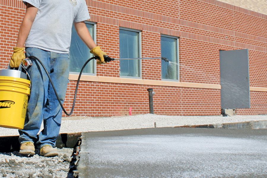 SMK Sprayers + P100WO bucket sprayer Concrete Construction Magazine